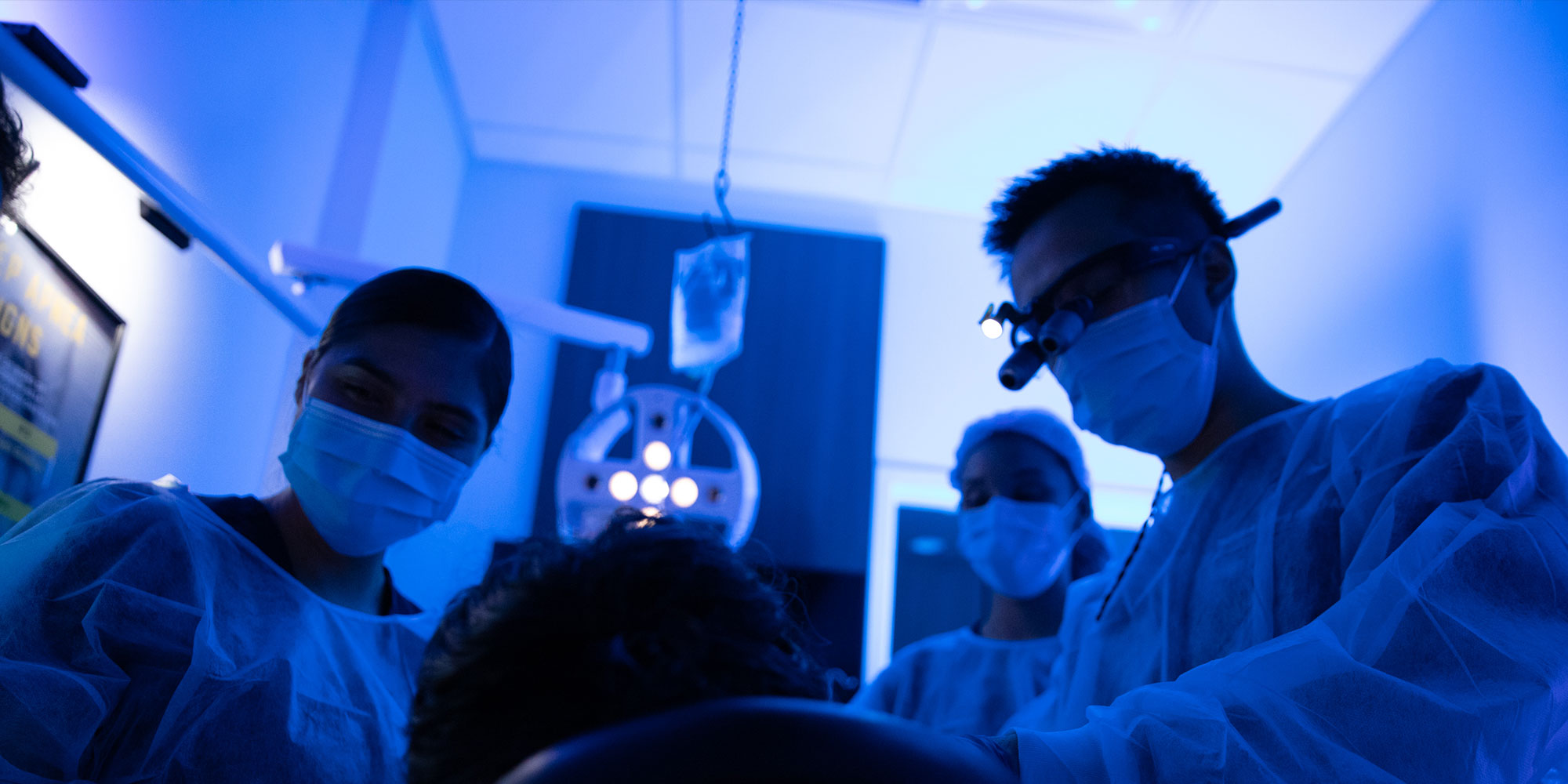 Dr. Chang performing bone grafting procedure